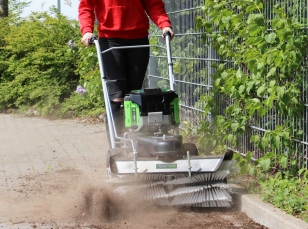 Battery powered sweeping machines